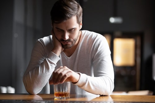 Man Brooding Alcohol MED Istock 1199696886 Credit Fizkes